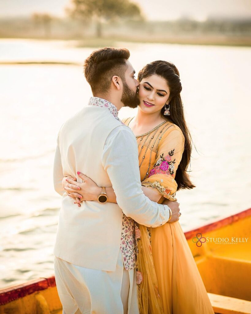 Photo of Two sisters pose together on the haldi ceremony