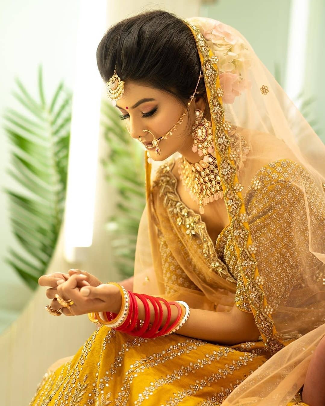 Pretty yellow lehenga with red dupatta for an engagement. See more on  wedmegood.com #wedmegood… | Indian wedding fashion, Ceremony dresses,  Stylish wedding dresses