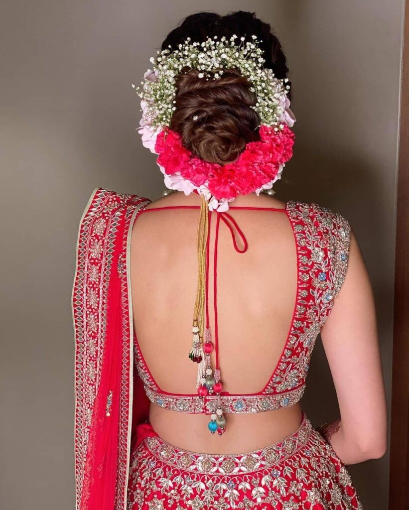 Indian Bridal Bun With Flowers