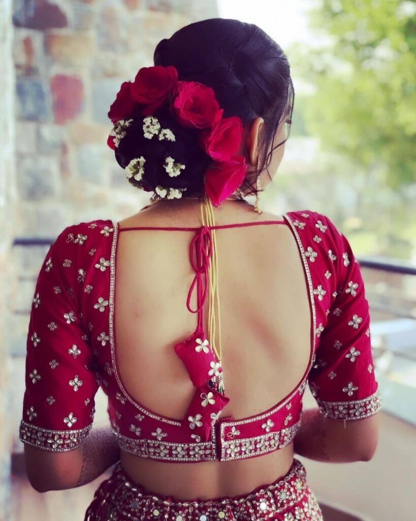 Indian Bridal Bun With Flowers