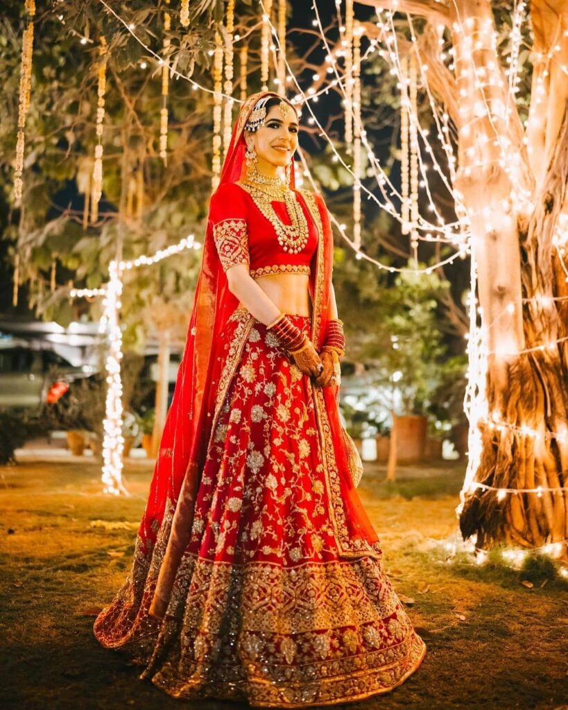 Red and orange bridal on sale lehenga