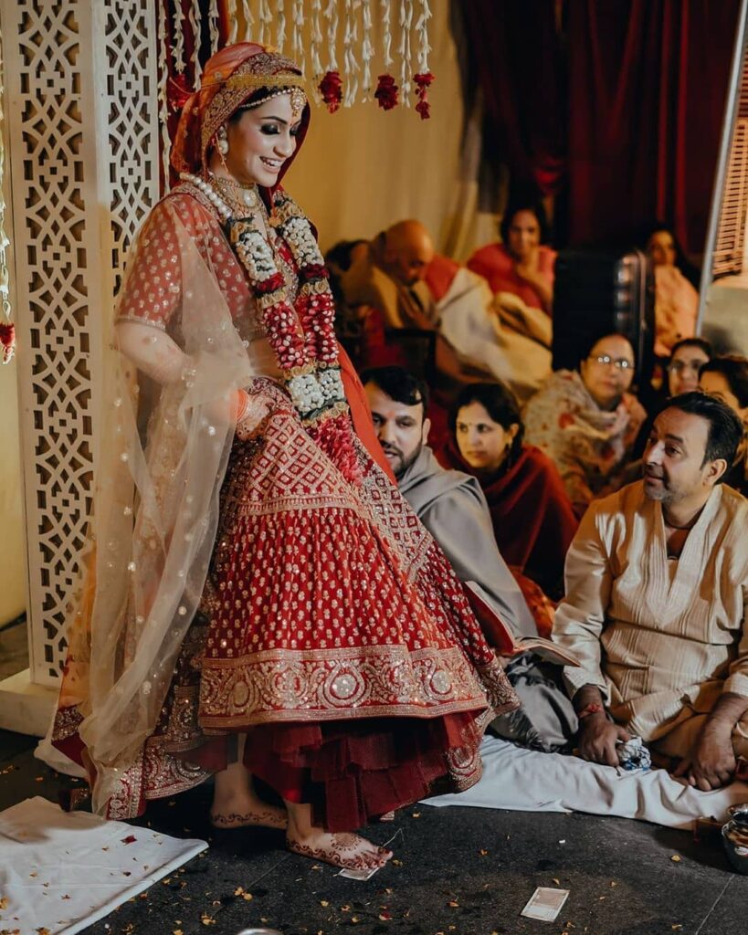 Red Wedding Lehenga With Golden Jewellery