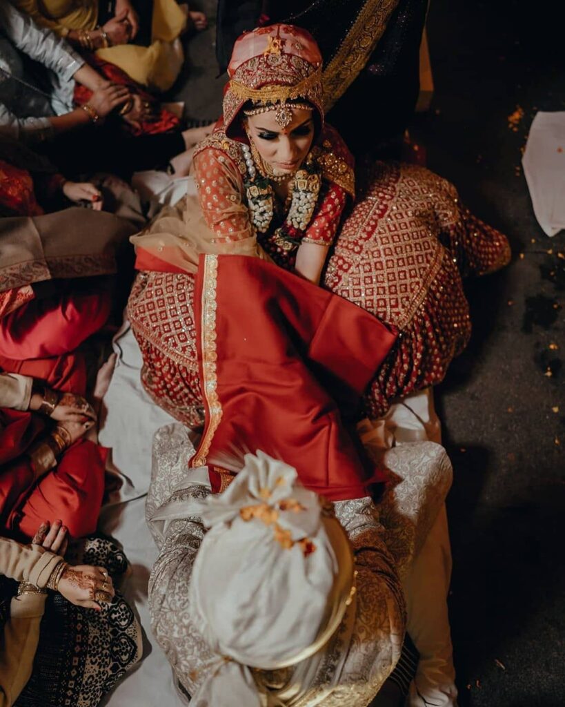 Red Wedding Lehenga With Golden Jewellery