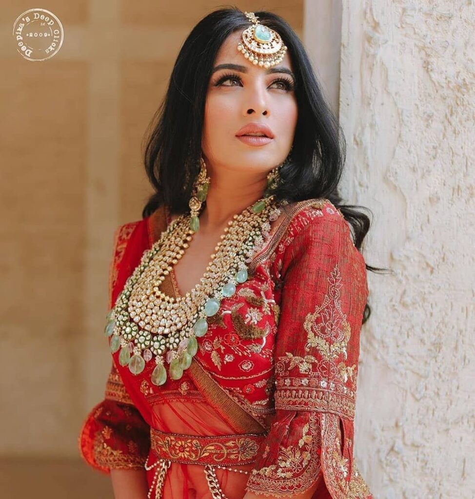 Red Bridal Lehenga With Jewellery