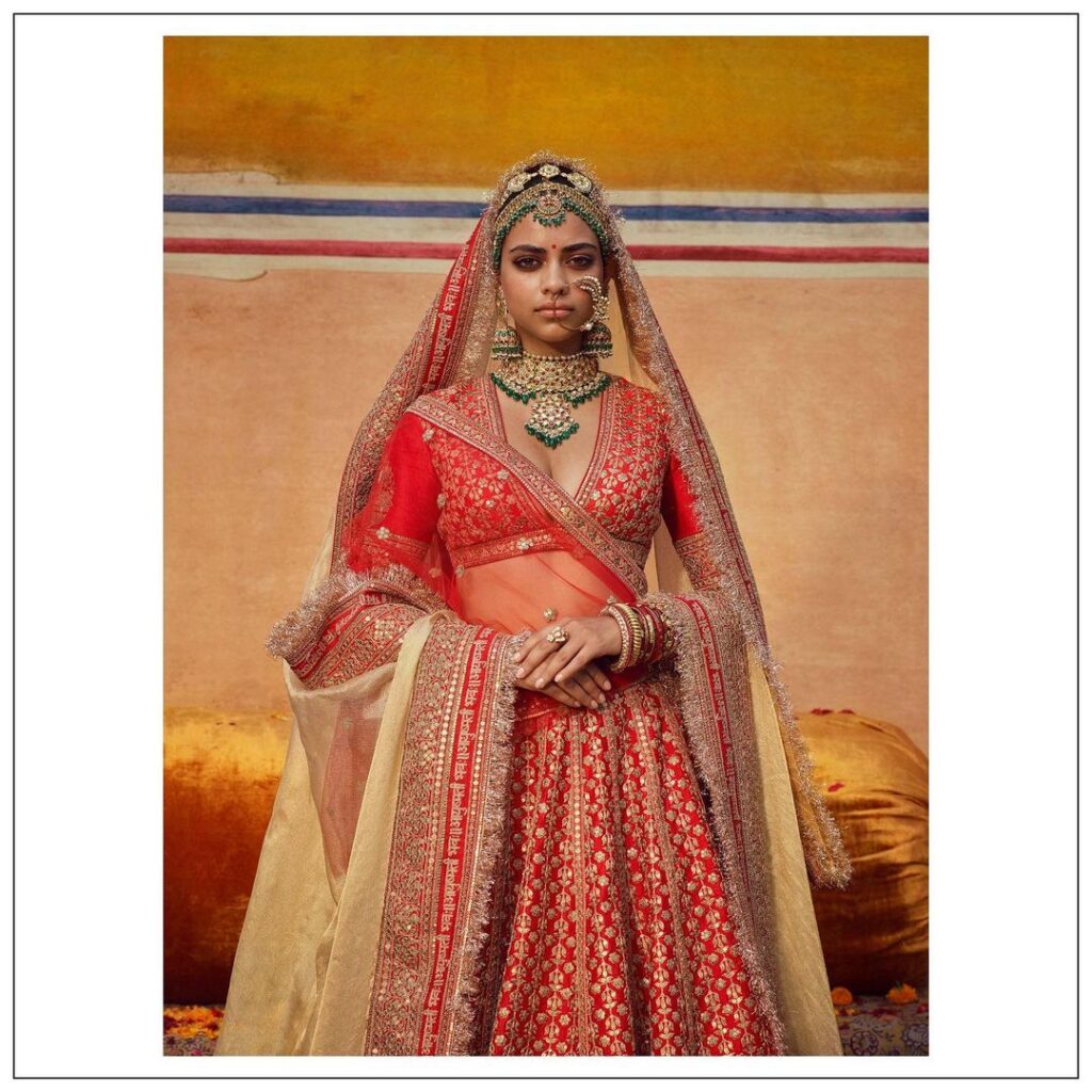Katrina Kaif makes for a GLORIOUS bride in a red Sabyasachi lehenga with  luminescent glam makeup | PINKVILLA