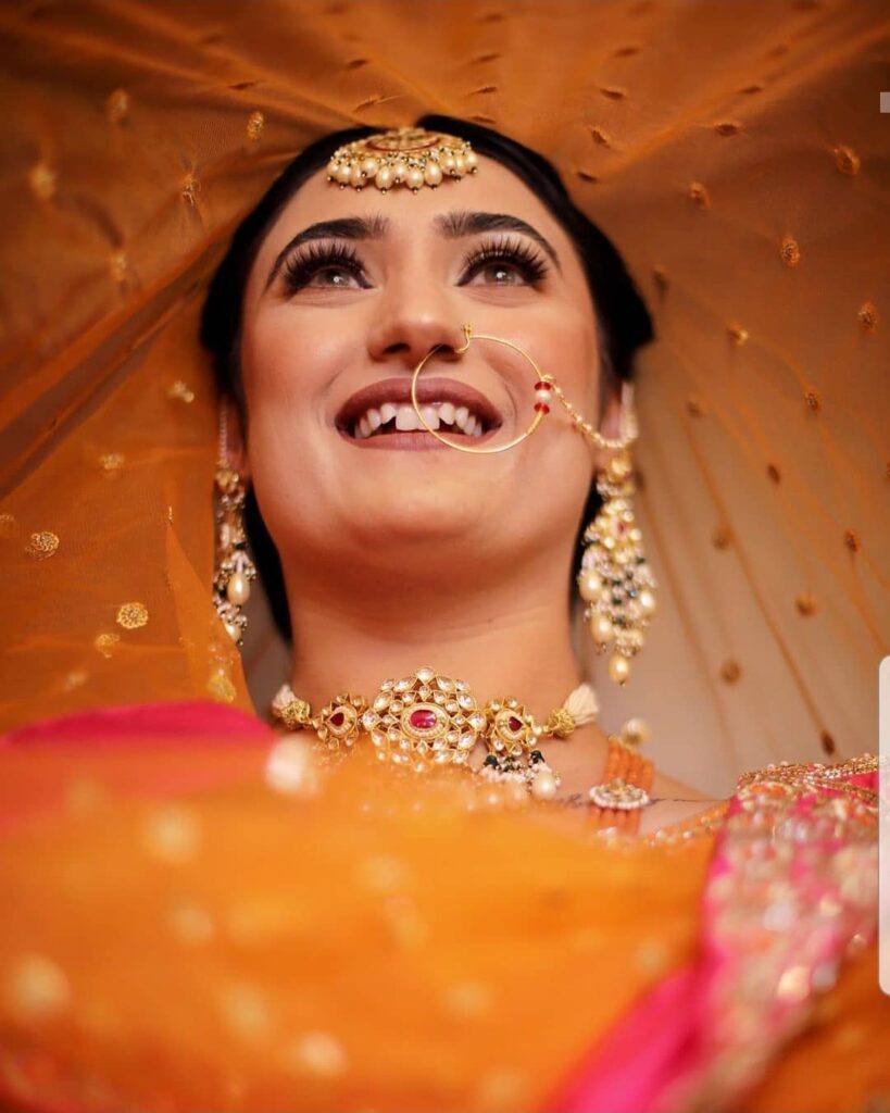 Kaptainching - Makeup and jewellery blending perfectly with her bridal  lehenga makes her one stunning Indian bride! Photography: YASH Gajjar  Photography Makeup Artist: Jasmine Beauty Care Download our free Wedzo app  or