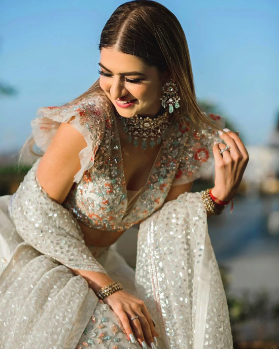 Bride In A Dreamy White Lehenga With Pastel Jewellery | Oh-so-dreamy! This  embellished ensemble and pastel jewellery gives a surreal charm to the  bridal beauty. 😍🤌🏻 Tag a bride-to-be for wedding look... |