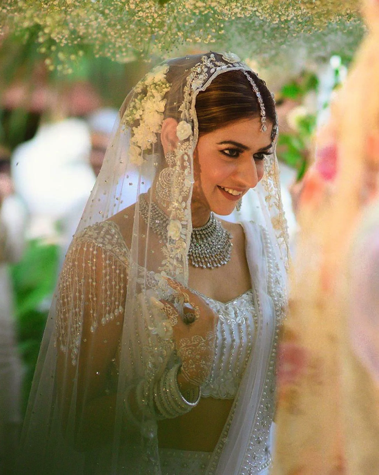 Sabyasachi Bride Looks Eternal In A 'Meenakari' Lehenga, Paired With A  Layered Pearl Necklace