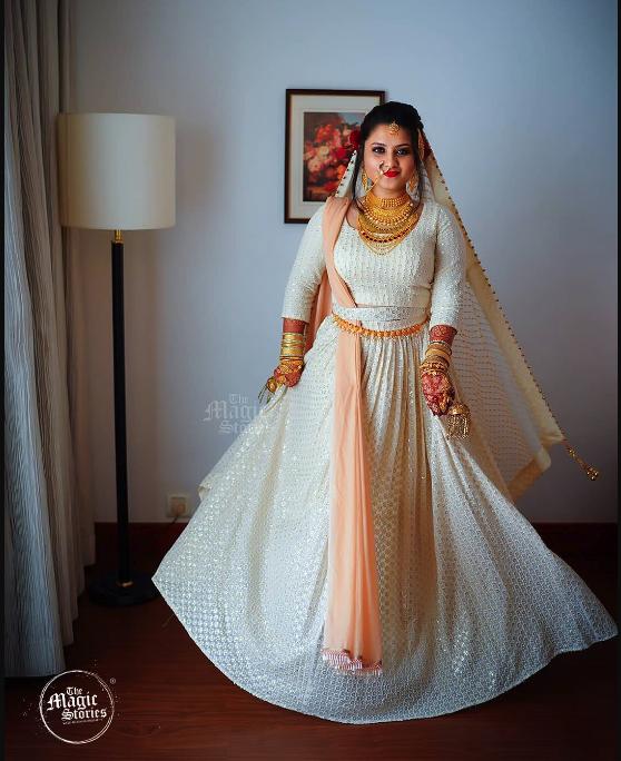 White bridal dress on sale with red dupatta