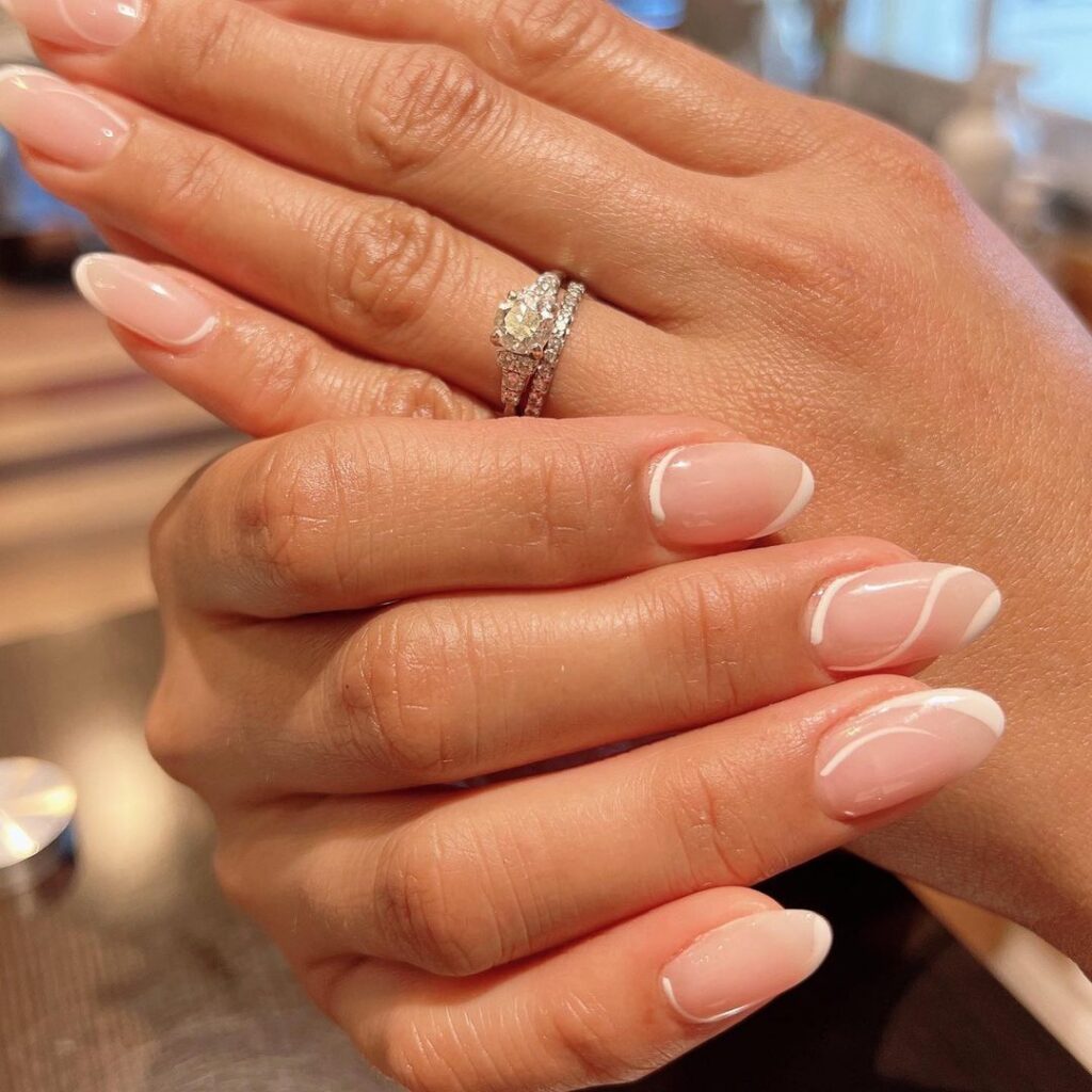 Pink And White Nails With Design